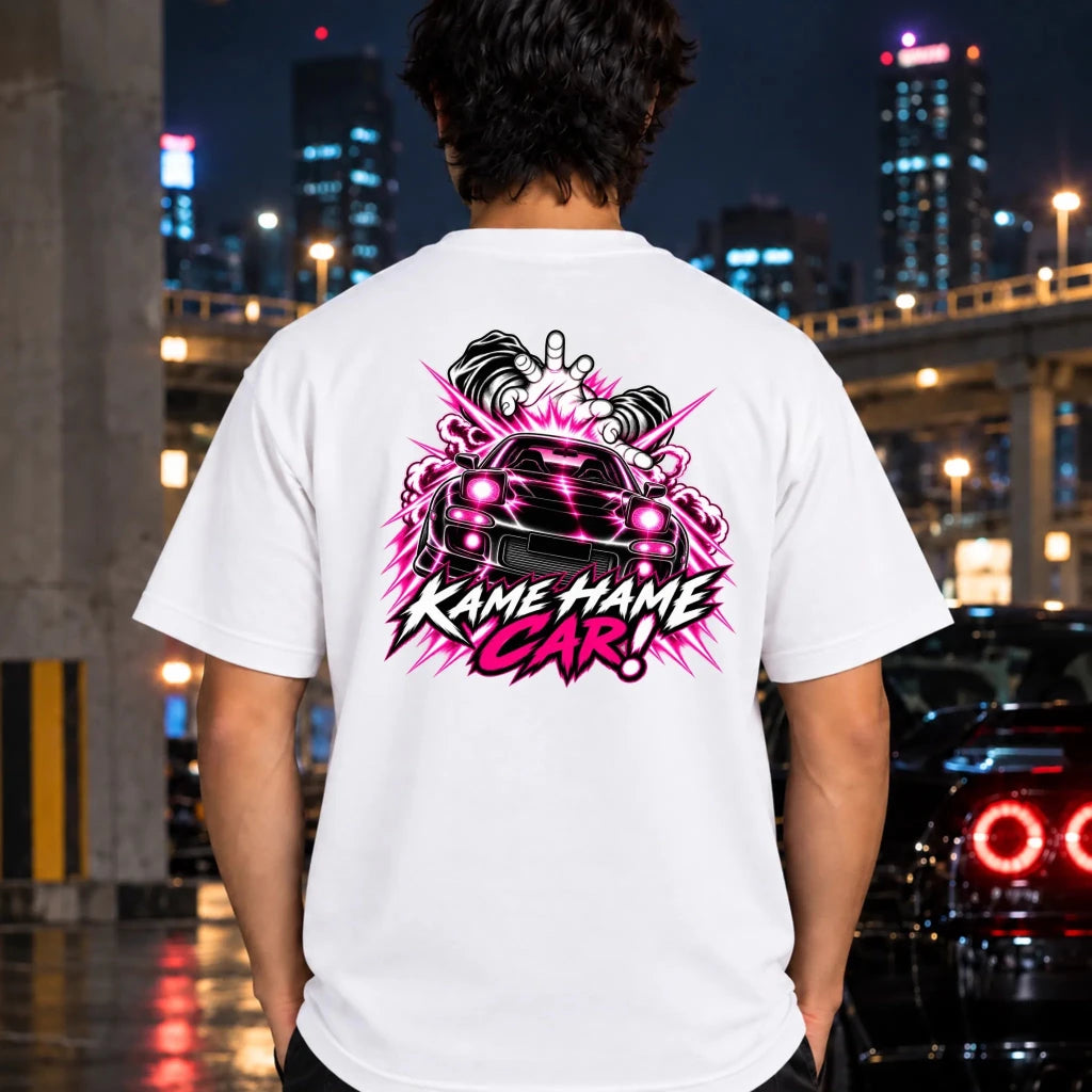 man wearing a white t-shirt featuring a large graphic print on the back of a black car with blue lightning effects and the text 'KAME HAME CAR!'.