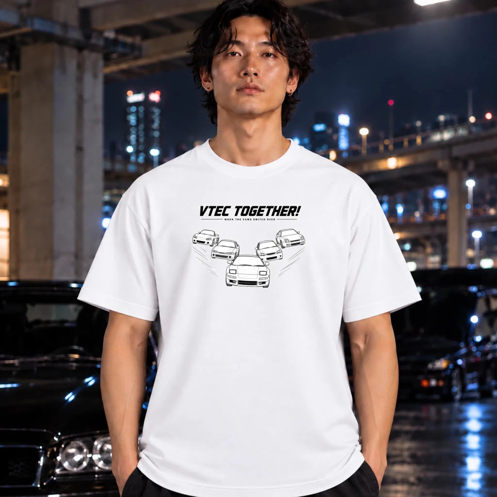 man wearing white t-shirt with a white graphic print of five cars and the text 'VITEC TOGETHER!'.