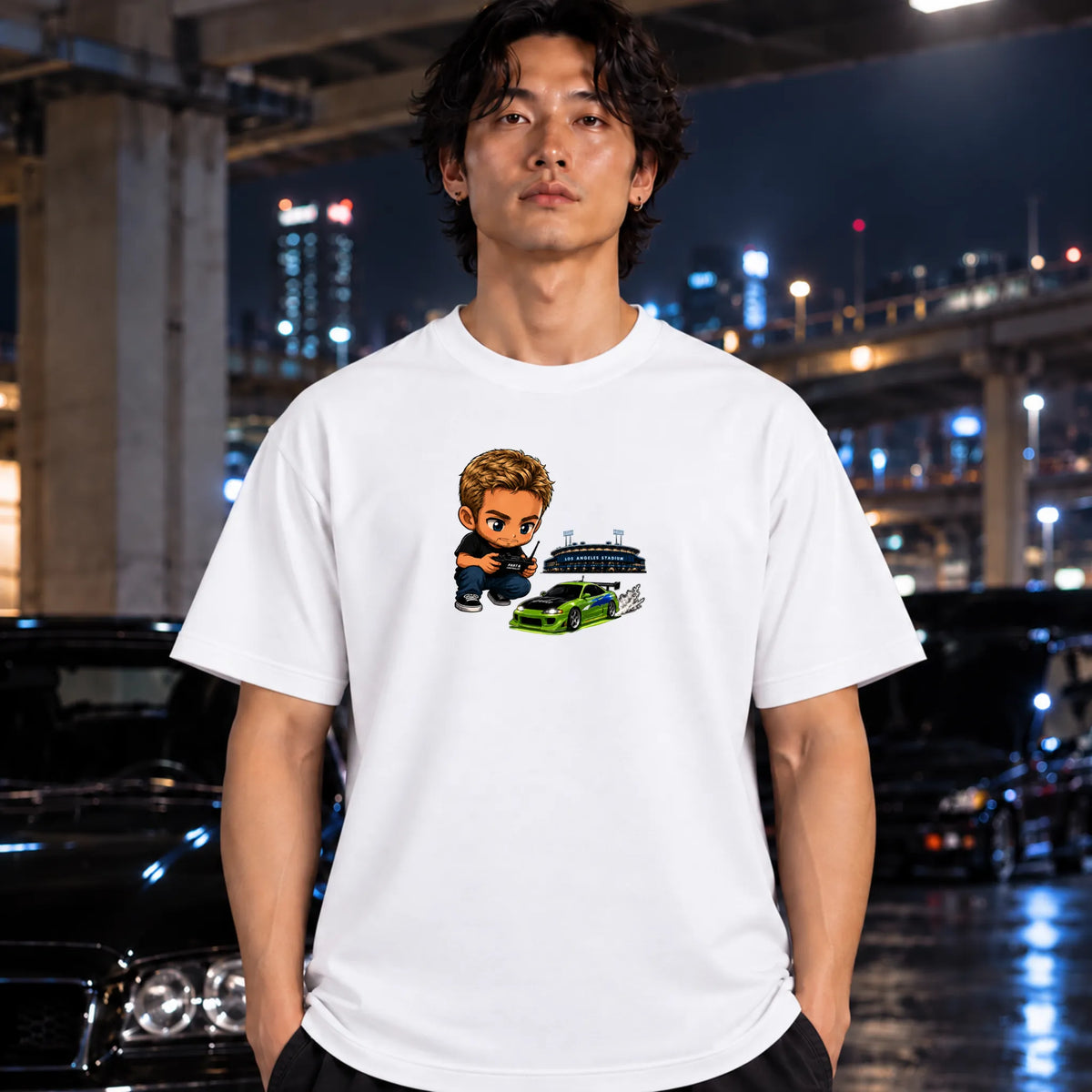 man wearing a white t-shirt. The graphic features a green car, and person controlling it with remote.