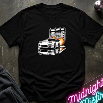 A black  short-sleeve t-shirt laid flat on a dark textured surface, featuring a graphic print of a white sports car in front of a blast off area.