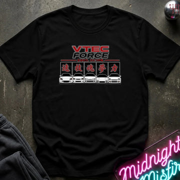 A black short-sleeve graphic t-shirt laid flat on a dark textured surface. The graphic features the text 'VTEC FORCE' in red and white, followed by Japanese katakana characters and a row of white sports cars.