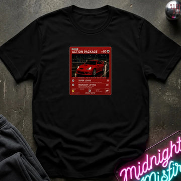 black crewneck t-shirt laid flat on a dark textured surface, featuring a red graphic print vintage card and a car.