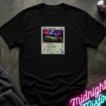 black crewneck t-shirt laid flat on a dark textured surface, featuring a graphic print of vintage card and a car.