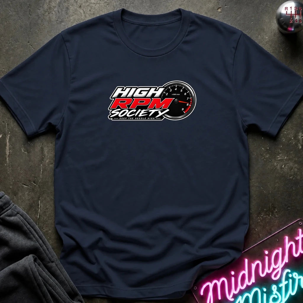 A navy blue short-sleeve t-shirt laid flat on a dark textured surface, featuring a 'High RPM Society' logo printed on the chest. The logo is white, red, and black, with a speedometer graphic.