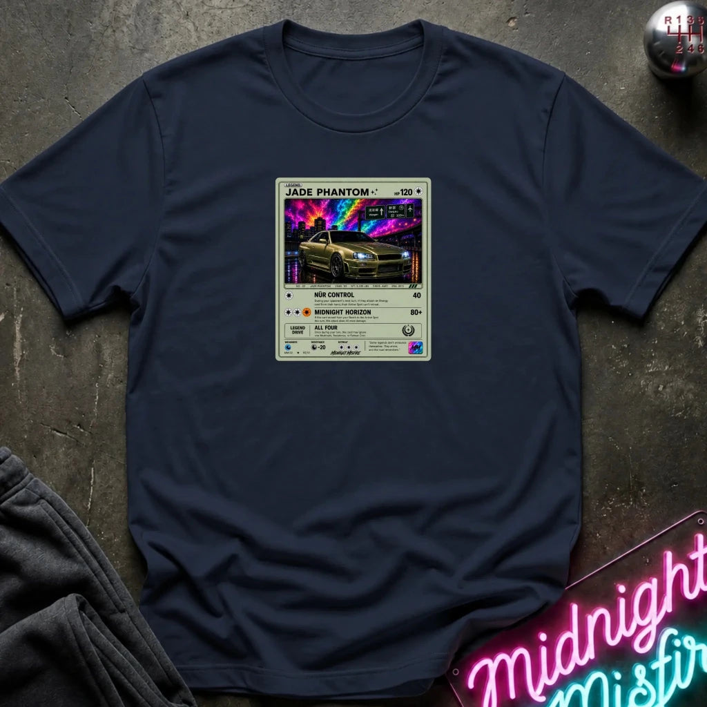 navy crewneck t-shirt laid flat on a dark textured surface, featuring a graphic print of vintage card and a car.
