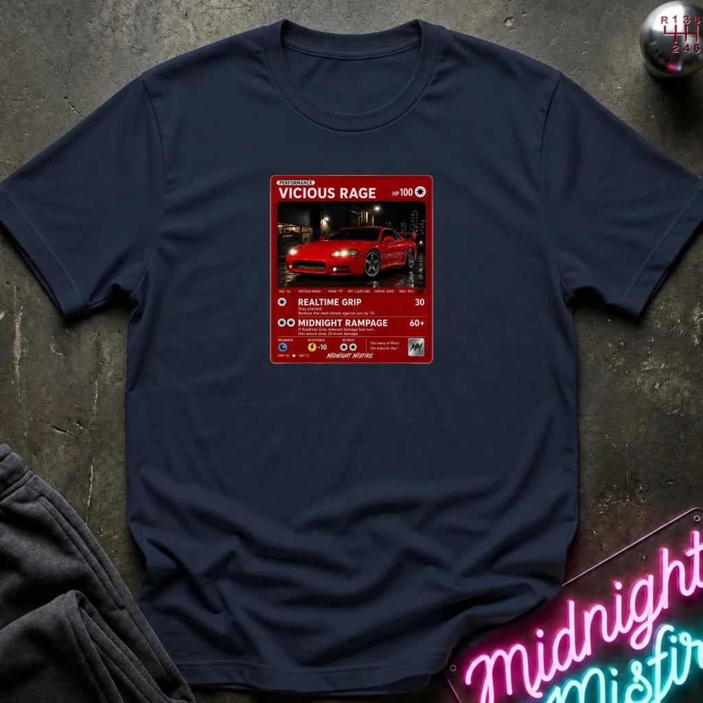 A navy blue crewneck t-shirt laid flat on a dark textured surface. The shirt features a red rectangular graphic print in the center with a red sports car 