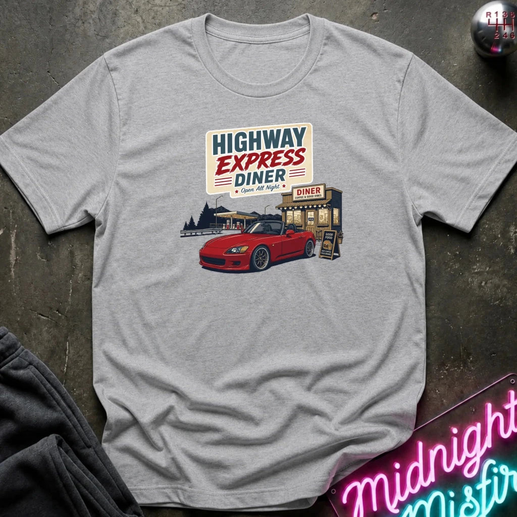 A light gray heather crewneck t-shirt featuring a retro-style graphic of a red sports car parked outside a diner with the text 'HIGHWAY EXPRESS DINER'. 