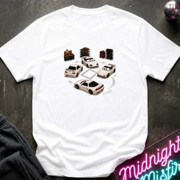 A white short-sleeve t-shirt laid flat on a dark textured surface, featuring a graphic print of several white sports cars arranged in a circle with drift-like tire marks.