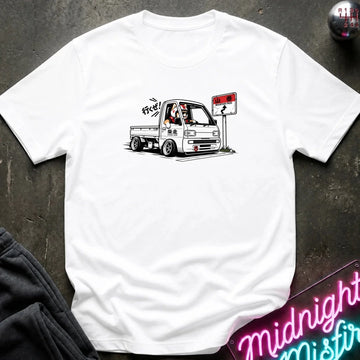 white short-sleeve crewneck t-shirt laid flat on a dark textured surface. The shirt features a graphic print of shiba inu dog.