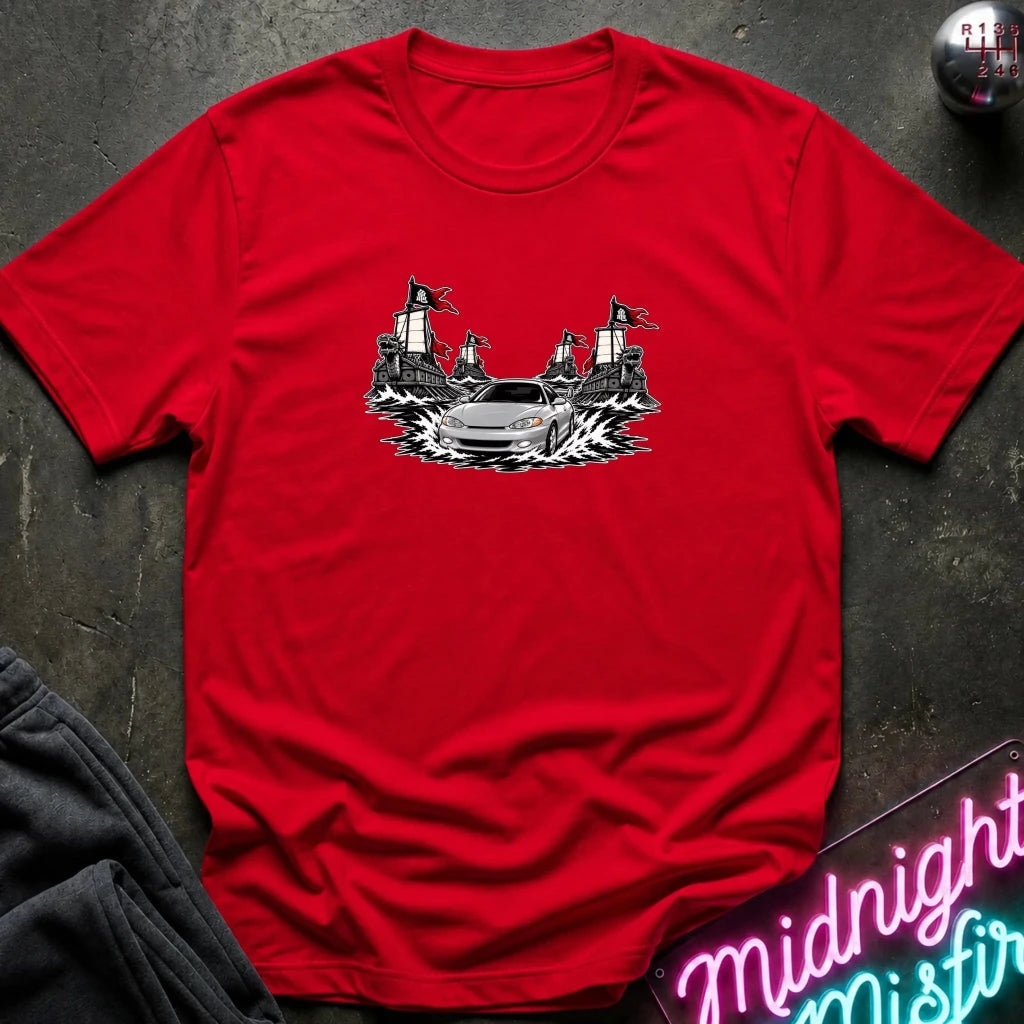 A red short-sleeved t-shirt that shows fleet of geobuksun and a silver shark car leading it.