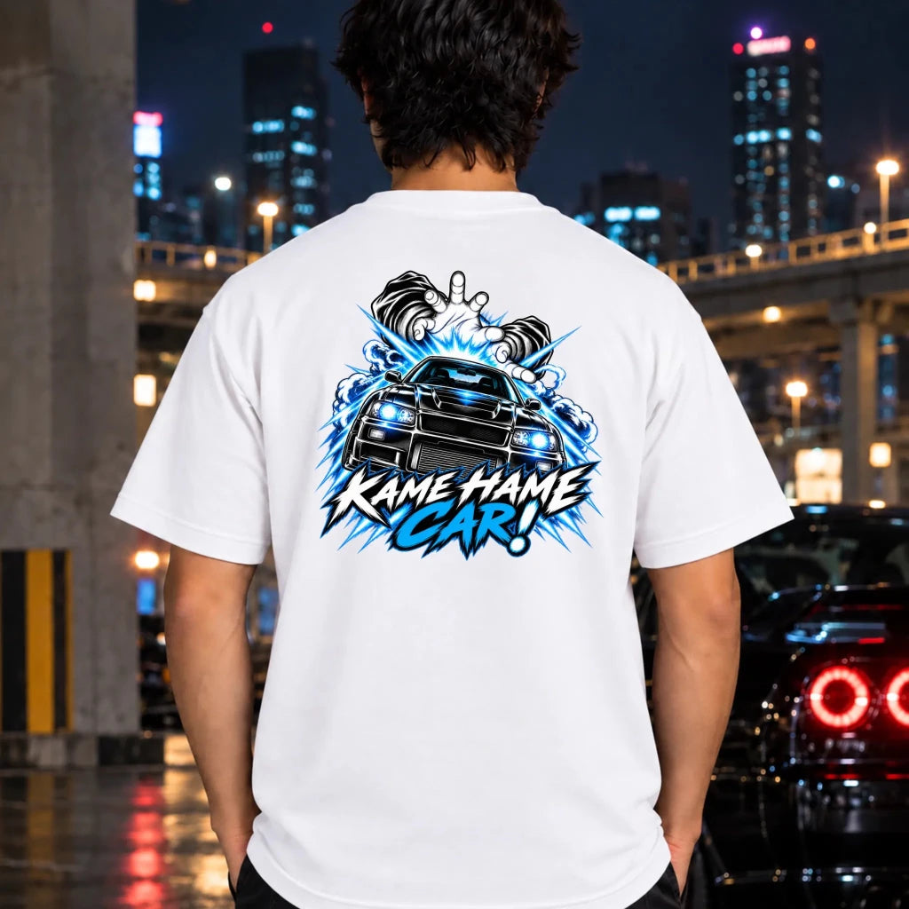 man wearing a white t-shirt featuring a large graphic print on the back of a black car with blue lightning effects and the text 'KAME HAME CAR!'.