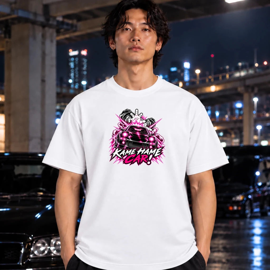 man wearing a white t-shirt. The shirt features a red, white, and black graphic of a car with the text 'KAME HAME CAR!' in stylized lettering.