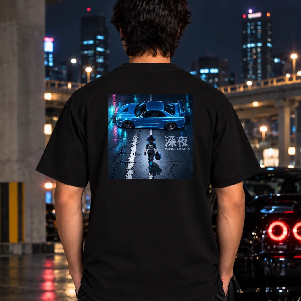 man wearing a white t-shit featuring a large graphic print on the chest of a blue sports car on a wet street at night with neon reflections and a figure walking in the middle.