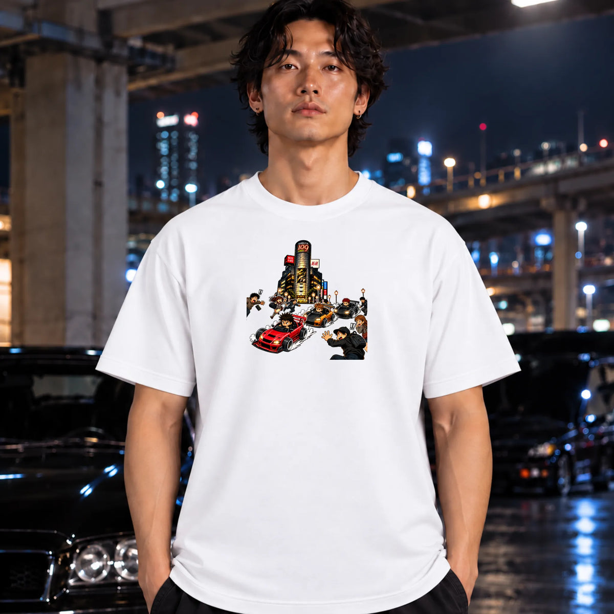A white short-sleeve crewneck t-shirt with a graphic print of a city street scene featuring a red sports car and small figure worn by a man