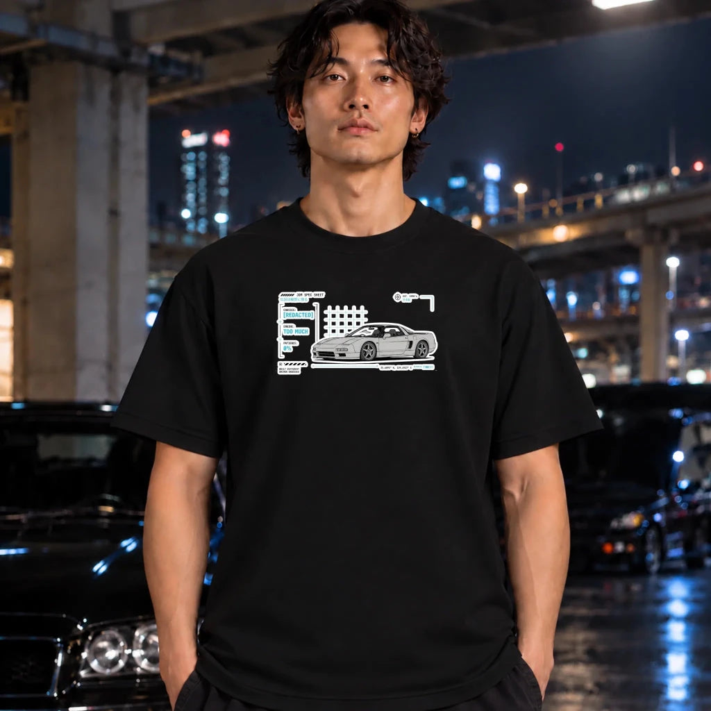black short-sleeve t-shirt with a white and gray graphic of a sports car next to a stylized track map, worn by a man